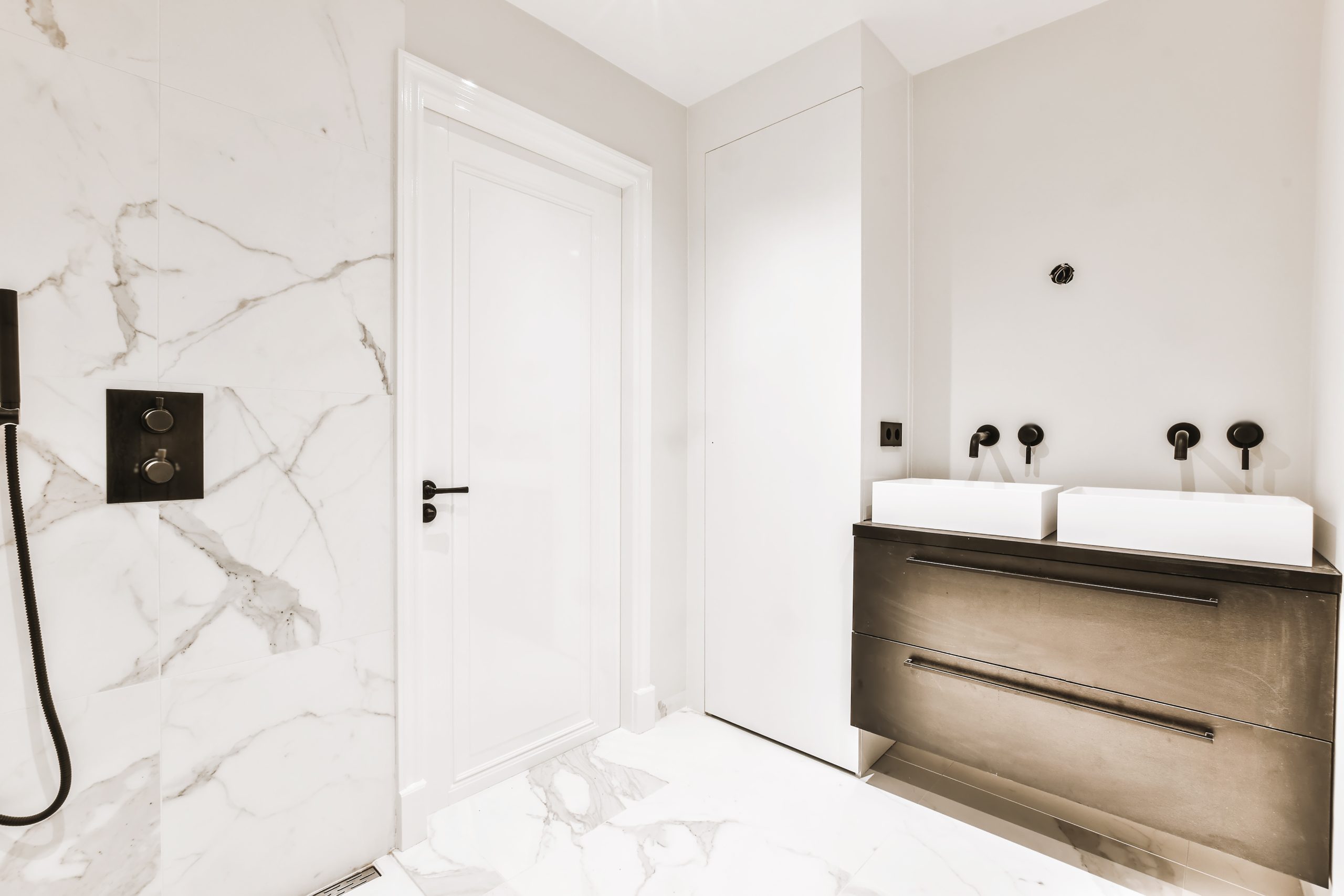 Stylish bathroom interior in elegant residential building